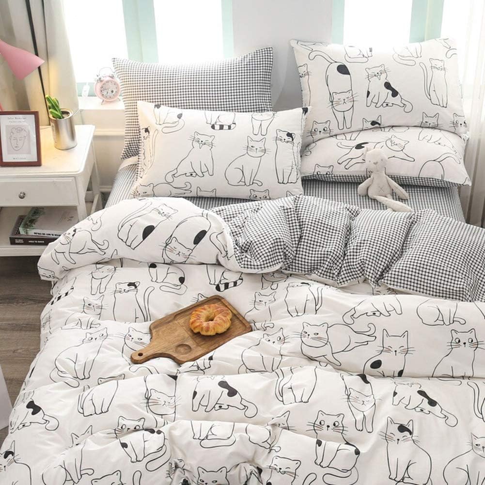 BlueBlue Cats Kids Duvet Cover Set front view of white cotton bedding with cartoon cat prints on a twin single bed