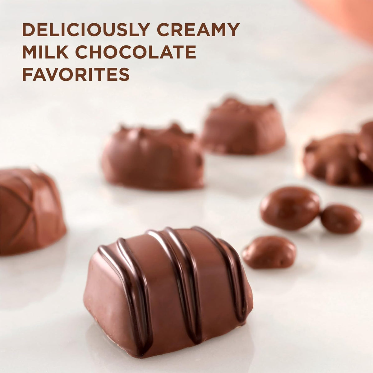 Handcrafted chocolate truffles and toffee pieces on a serving platter