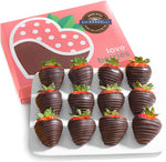 Top view of twelve dark chocolate coated strawberries