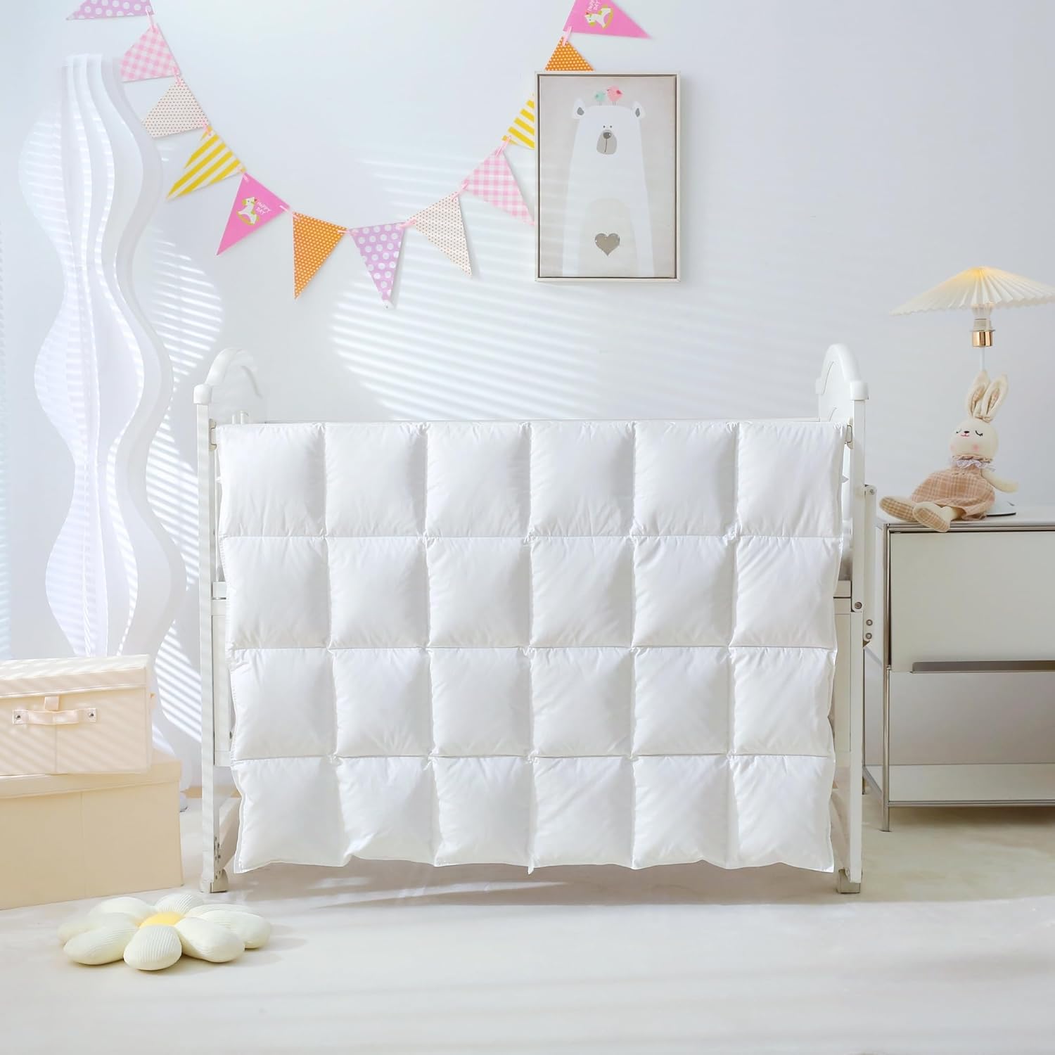 CLoucl baby crib comforter front view showing premium white goose down filling and soft white cotton shell fabric