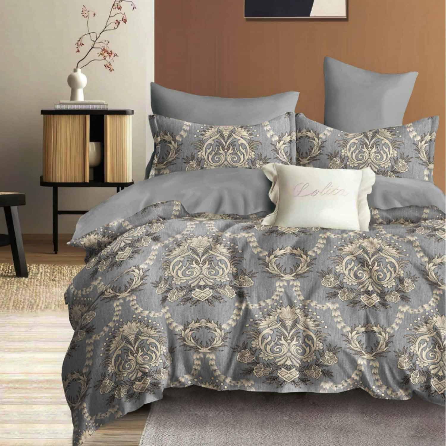 Nanko grey paisley duvet cover queen set laid out on a bed showing the front vintage pattern view