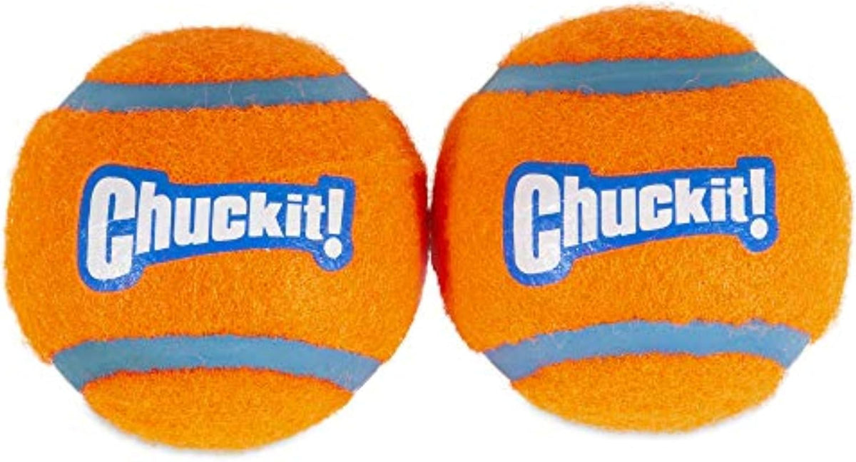 Chuckit 2 inch dog ball next to launcher compatibility scale