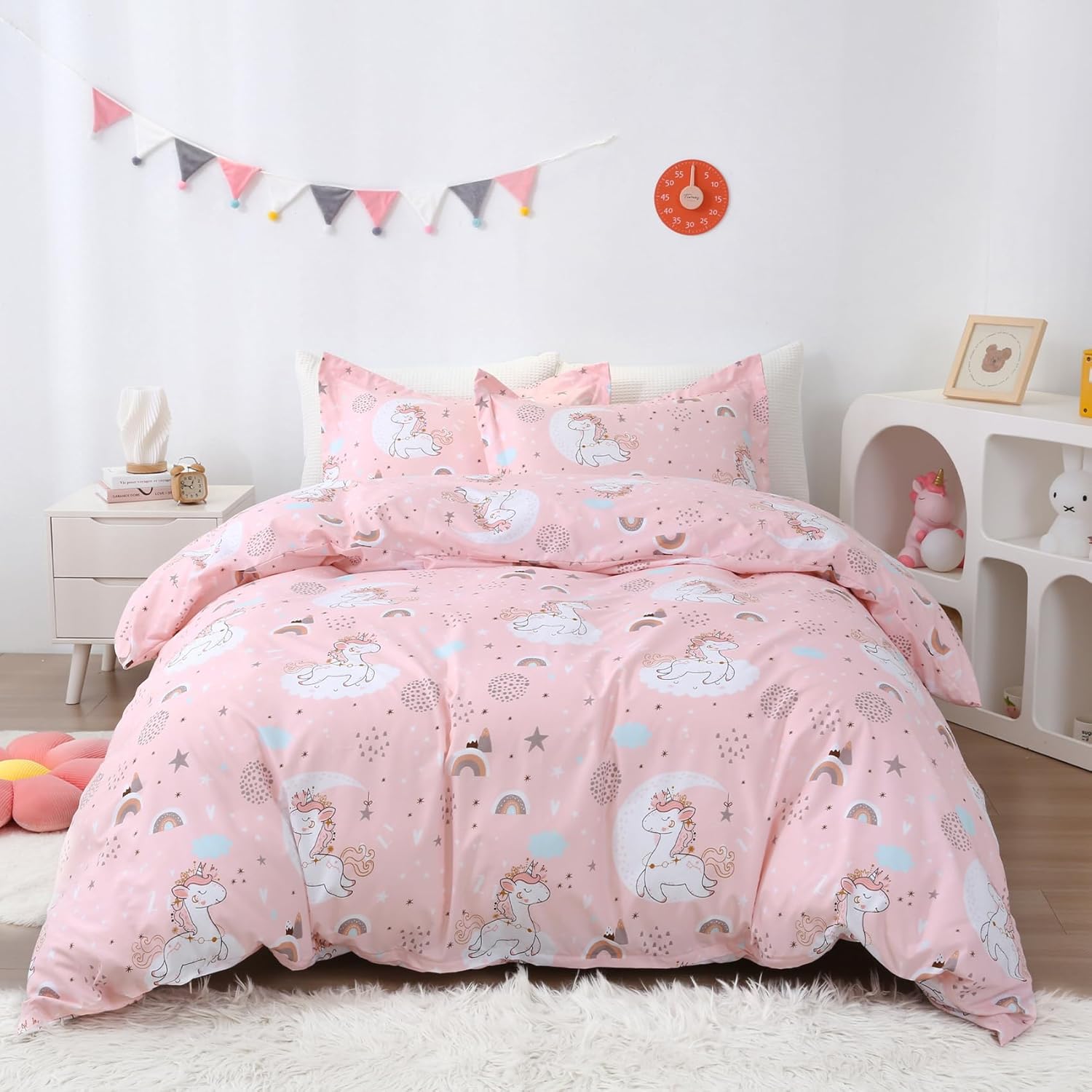 JSD Pink Unicorn Kids Duvet Cover Set Twin Size front view on a styled girls bed.