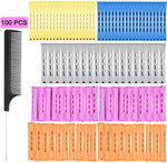 Close up view of the five color-coded sizes of cold wave hair rollers