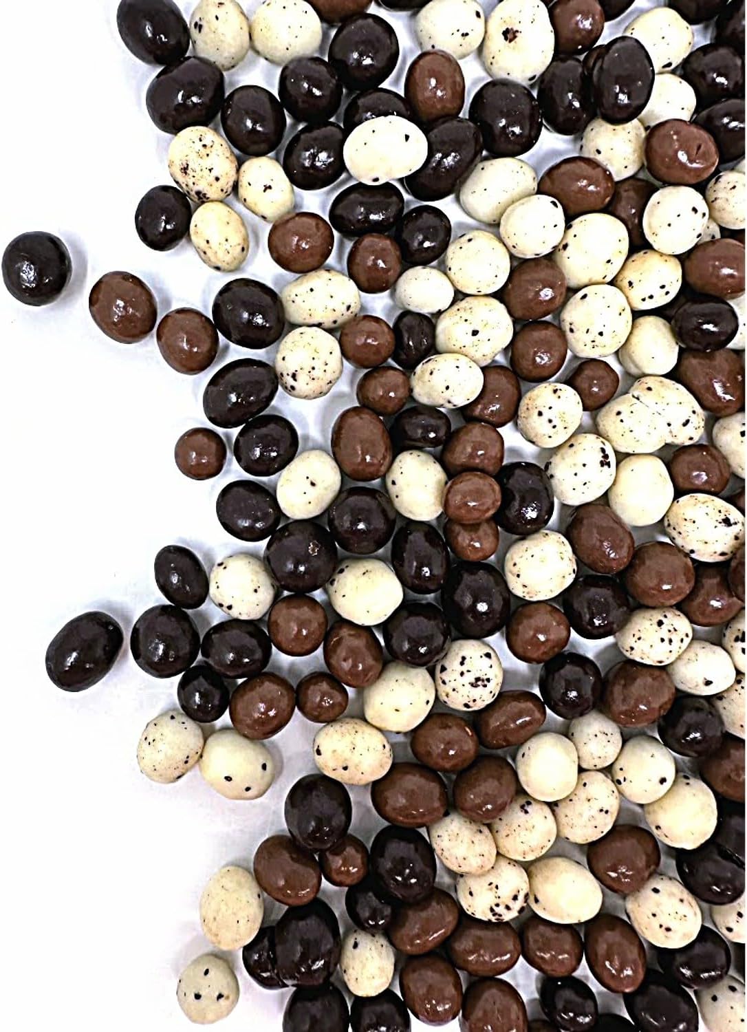 Whole roasted espresso coffee beans inside a broken chocolate coating