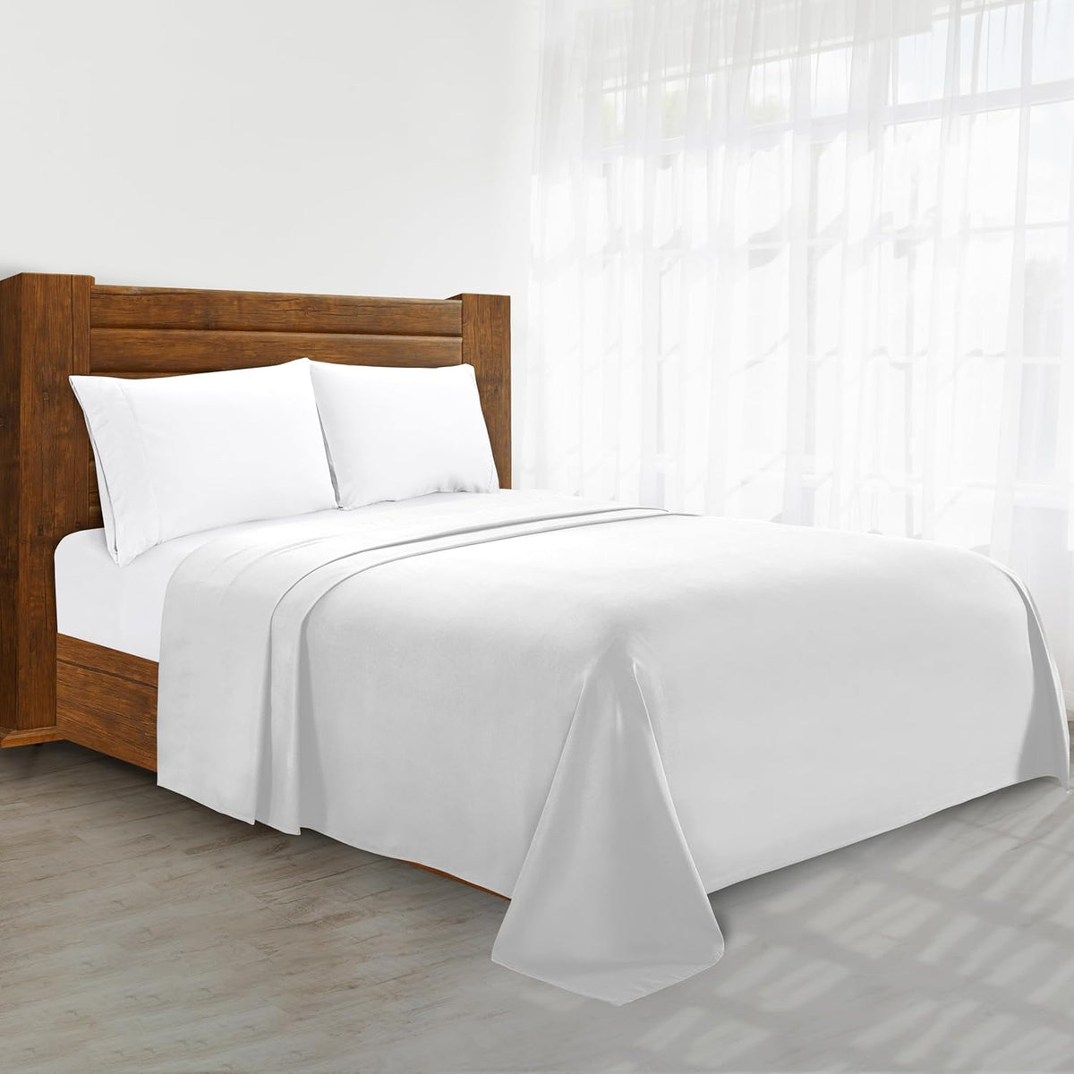 Elegant Comfort 1500 thread count flat sheet front view on a luxury king bed.