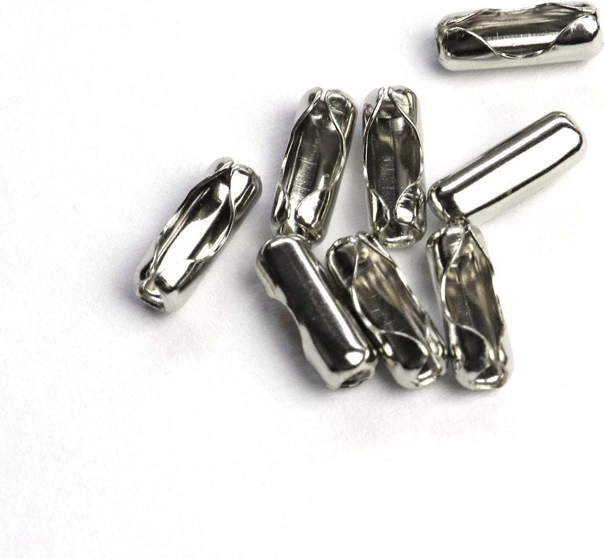 Demonstration of ball chain connector clasps used for dog tags.