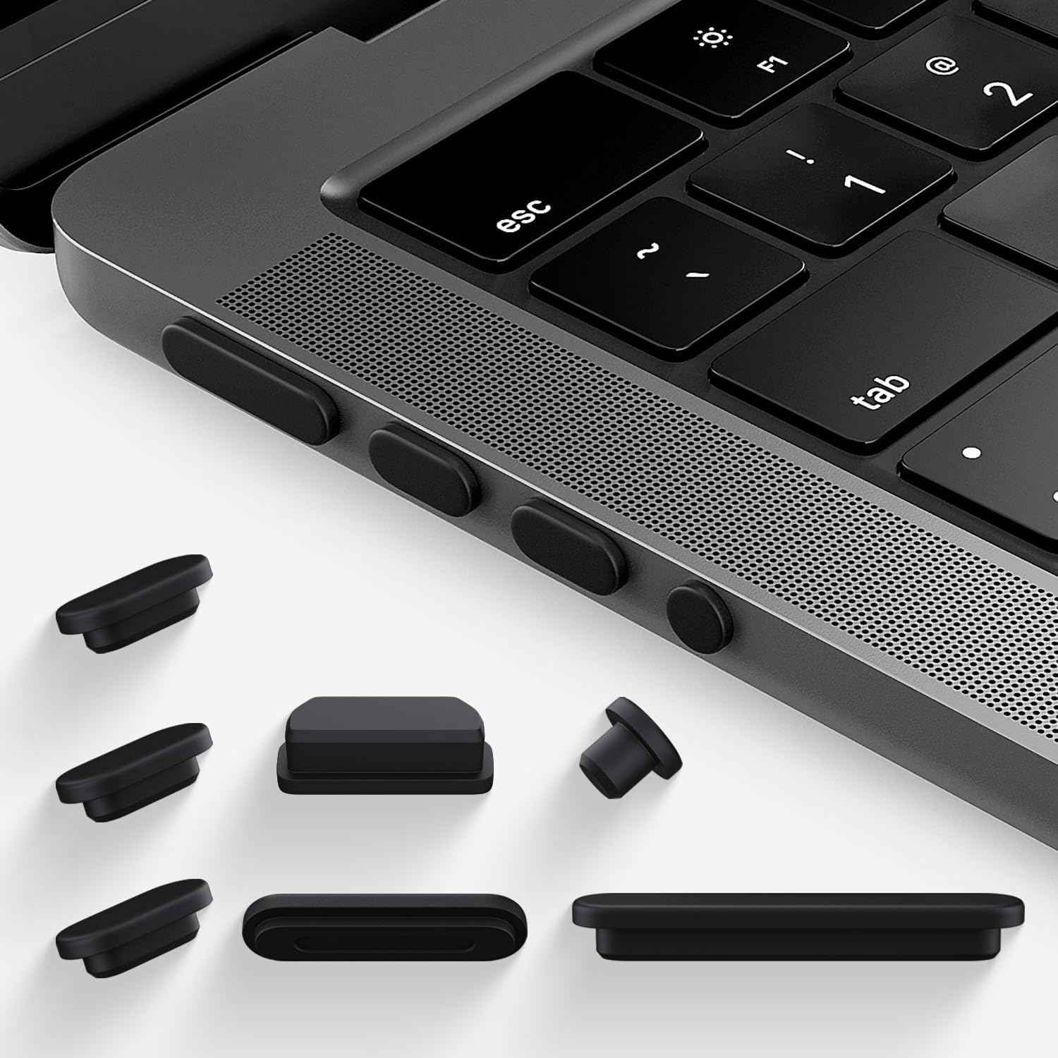 CaseBuy 7 Piece MacBook anti dust port plugs set in retail packaging showing front view.