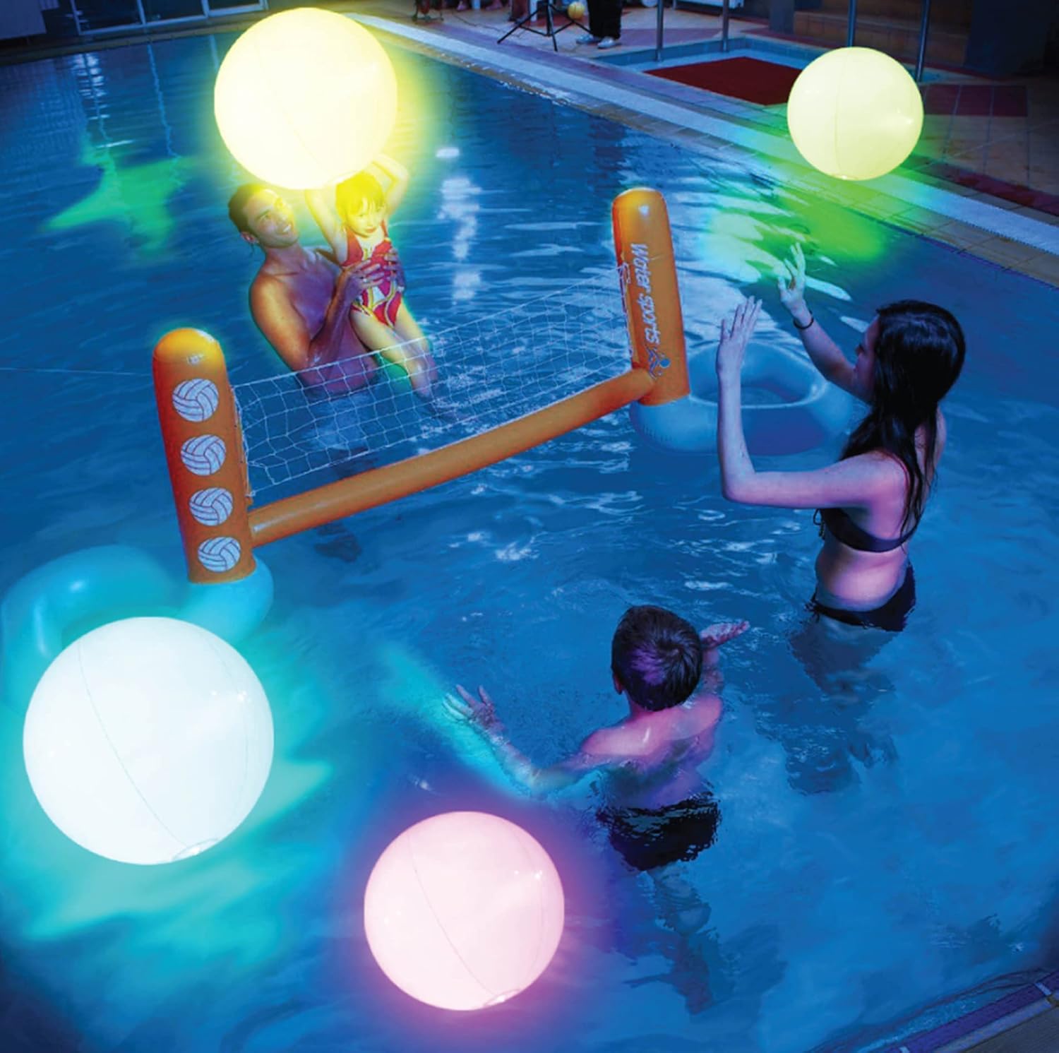 FLAMDYNO light up beach balls four pack front view showing glowing LED colors in a swimming pool