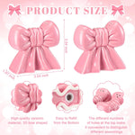 LemonRoad ceramic pink bow shakers showing top hole configuration detail