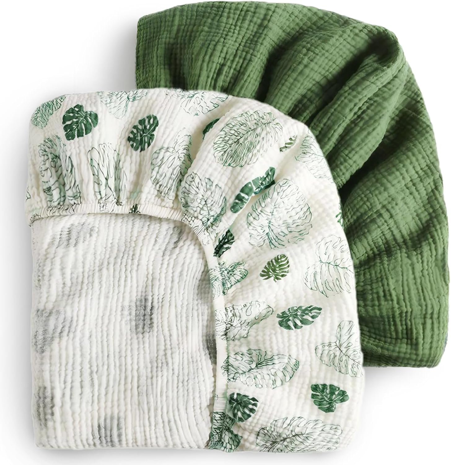 Blissful Diary muslin crib sheets in monstera and dark green print