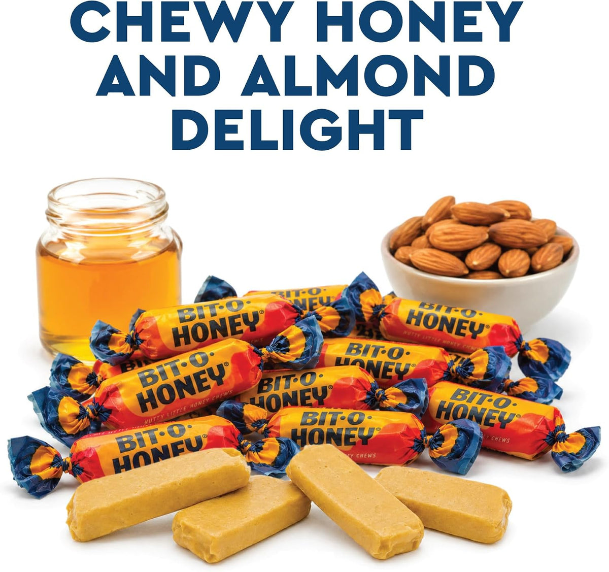 Honey and almond taffy pieces scattered around bulk candy pouch