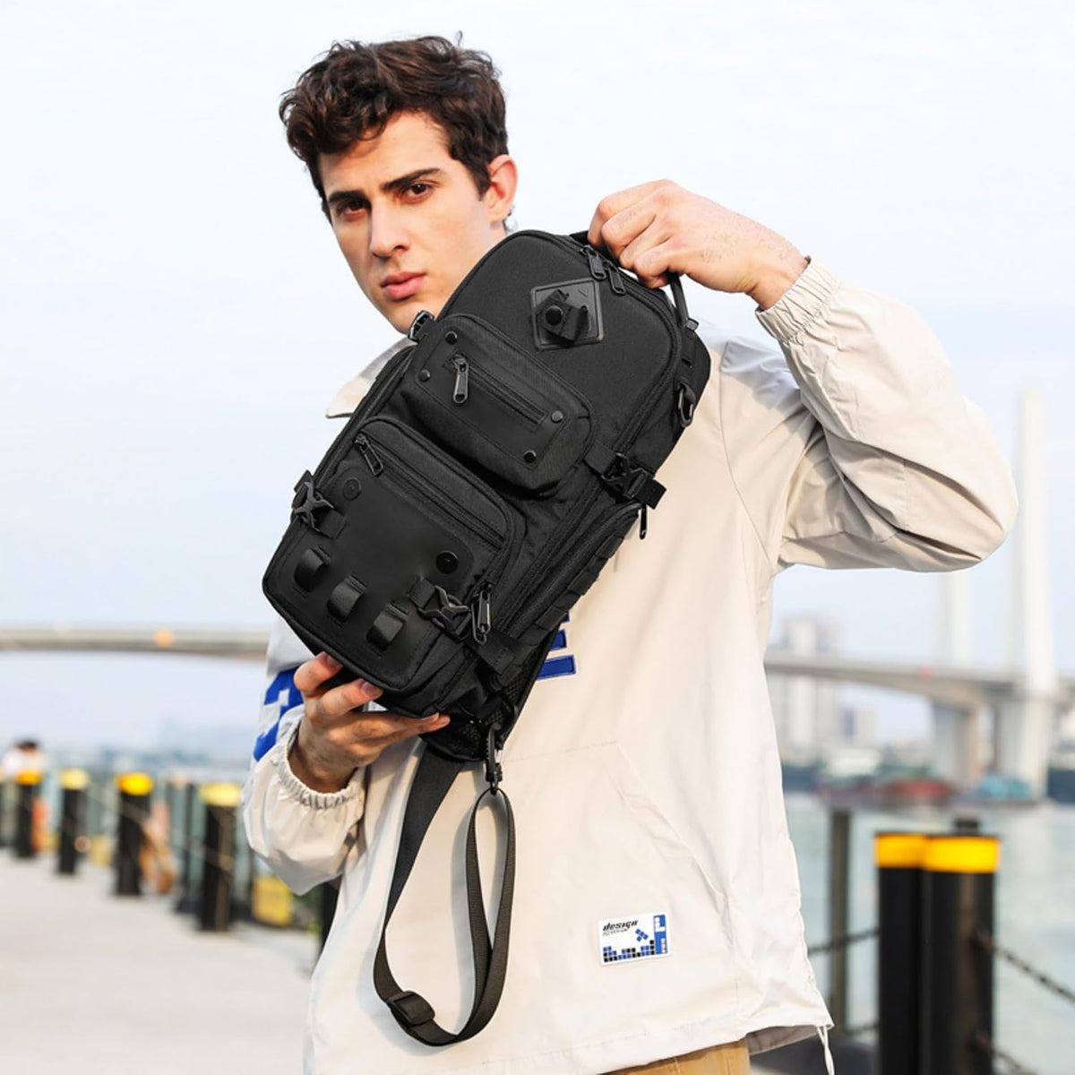 OZUKO waterproof chest pack showing 90-degree wide opening