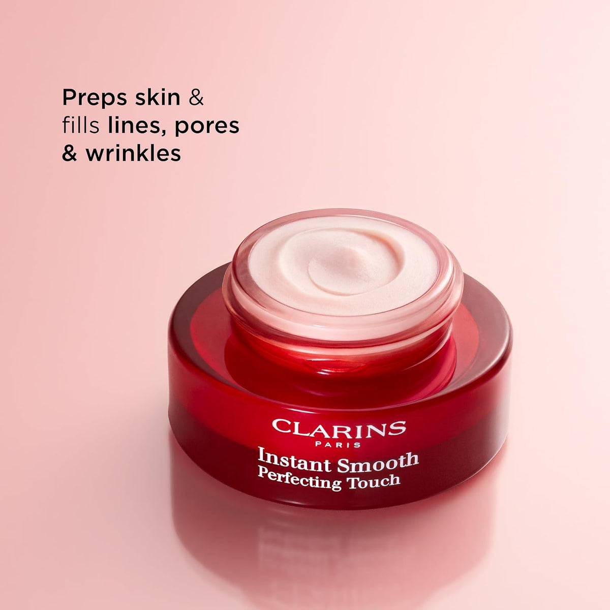 Clarins face makeup pore minimizer container open showing texture