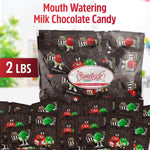Individually wrapped fun-size packets of imported milk chocolate candy spread out cleanly.