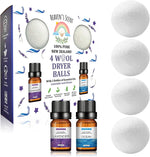 Heaven's Scent Wool Dryer Balls with Essential Oils Bundle front view showing four white laundry balls and fragrance bottles.