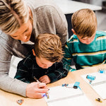 Working paper circuit illuminated with coin battery and small light