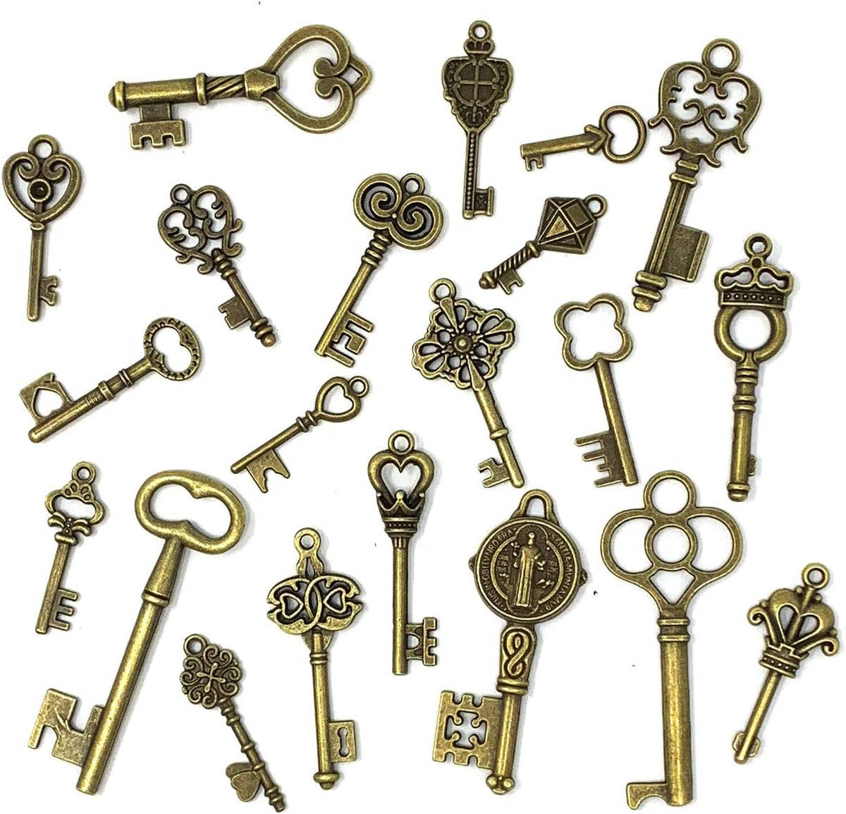 Assorted bronze brass skeleton keys laid out for crafts