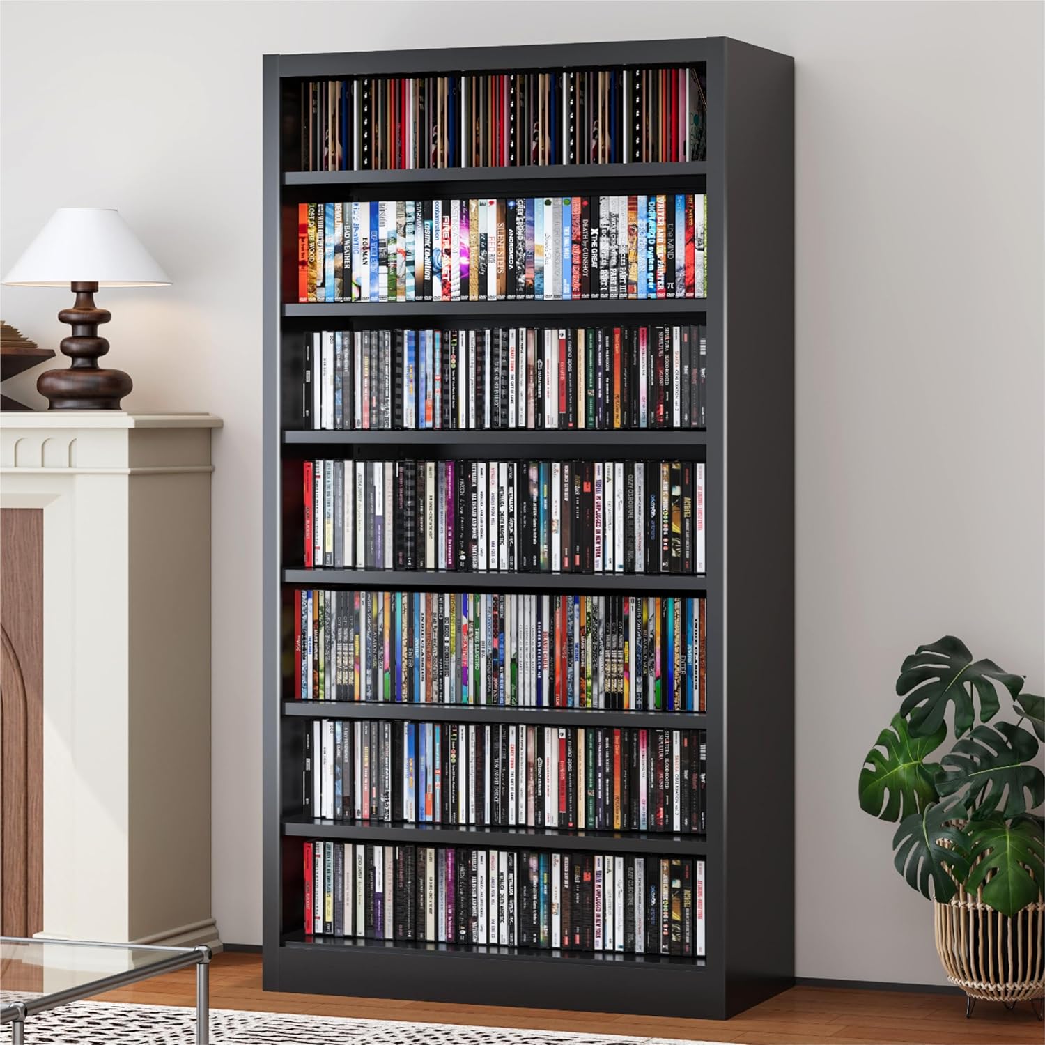 DUTYSEST metal DVD storage cabinet front view showing a seven tier black media rack filled with books and media cases.