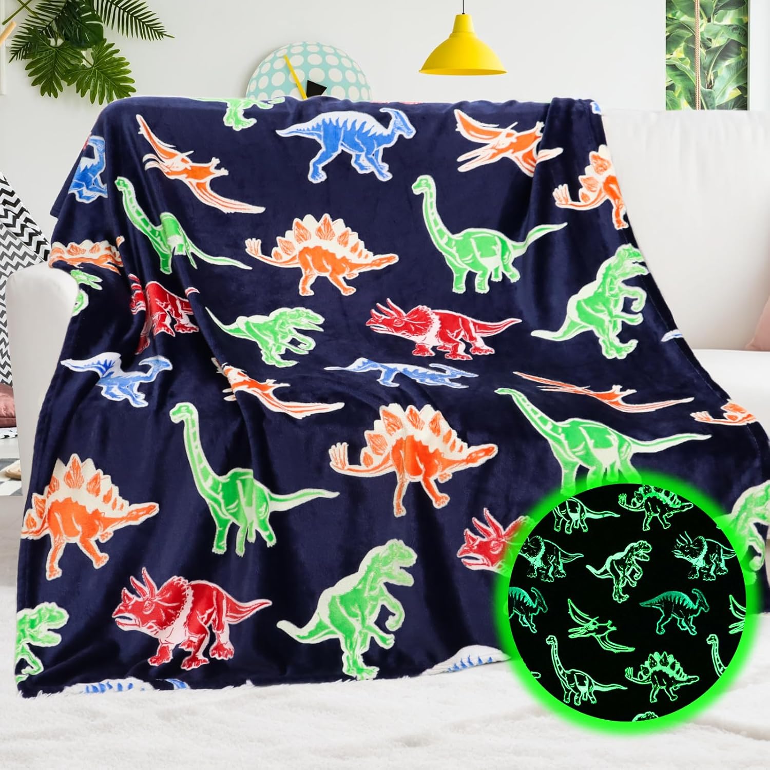 BORORO dinosaur glow in the dark blanket front view spread on a kids bed showing luminous T-Rex illustrations