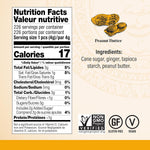 Individually wrapped gourmet peanut butter ginger candies scattered next to the bulk packaging.