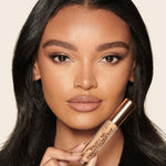 Charlotte Tilbury multitasking radiant finish concealer bottle standing upright