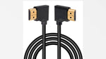 Durable multi functional audiovisual cord linking a modern laptop terminal to an office projector unit