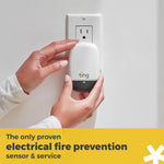 Ting Fire sensor plugged into a wall outlet