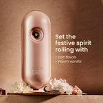 Godrej automatic air freshener mounted on a living room wall
