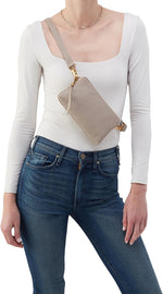 HOBO Fern Slim Belt Bag worn as crossbody sling
