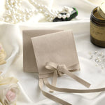 Stack of 80 pieces microfiber jewelry pouches showing compact size.