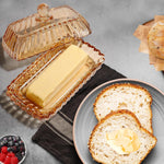 Mamalucky covered butter dish holding a standard 4 ounce butter stick