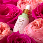 Side profile of Pixi Beauty Rose Oil glass bottle