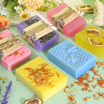 Finished handmade soap bars featuring natural botanical embedded designs