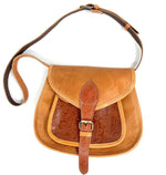 The Tannery women crossbody bag side profile and adjustable hardware details.