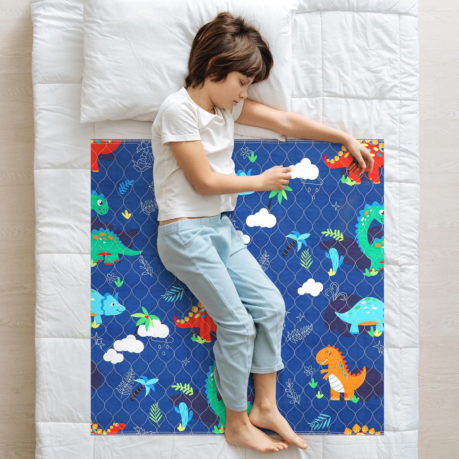 Newwiee Dinosaur Potty Training Bed Pad front view with dinosaur pattern