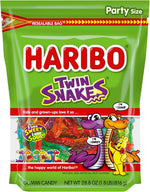 Assorted colorful Haribo Goldbears gummies spilled neatly next to the resealable packaging.
