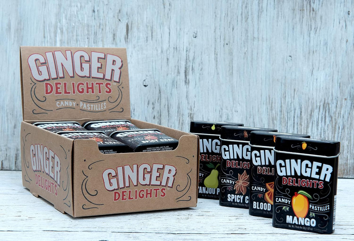 Twelve pack case of imported Ginger Delights hard candy pastilles box view.