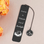 Book lovers gift metal bookmark placed inside an open fantasy novel