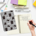 Xqumoi cat notebook displayed with back to school supplies