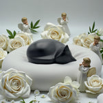 Comemori matte black resin cat cremation urn showing smooth hand-sculpted details