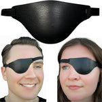 Extraordinary Commissary Black Leather Eye Patch front view showing the premium textured genuine leather finish and protective 3D concave dome design.