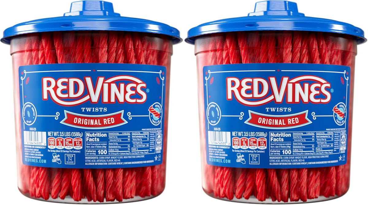 Close up view of the authentic soft and chewy red licorice candy twists texture inside the container.
