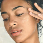 Clarins hydrating face treatment displayed with botanical ingredients