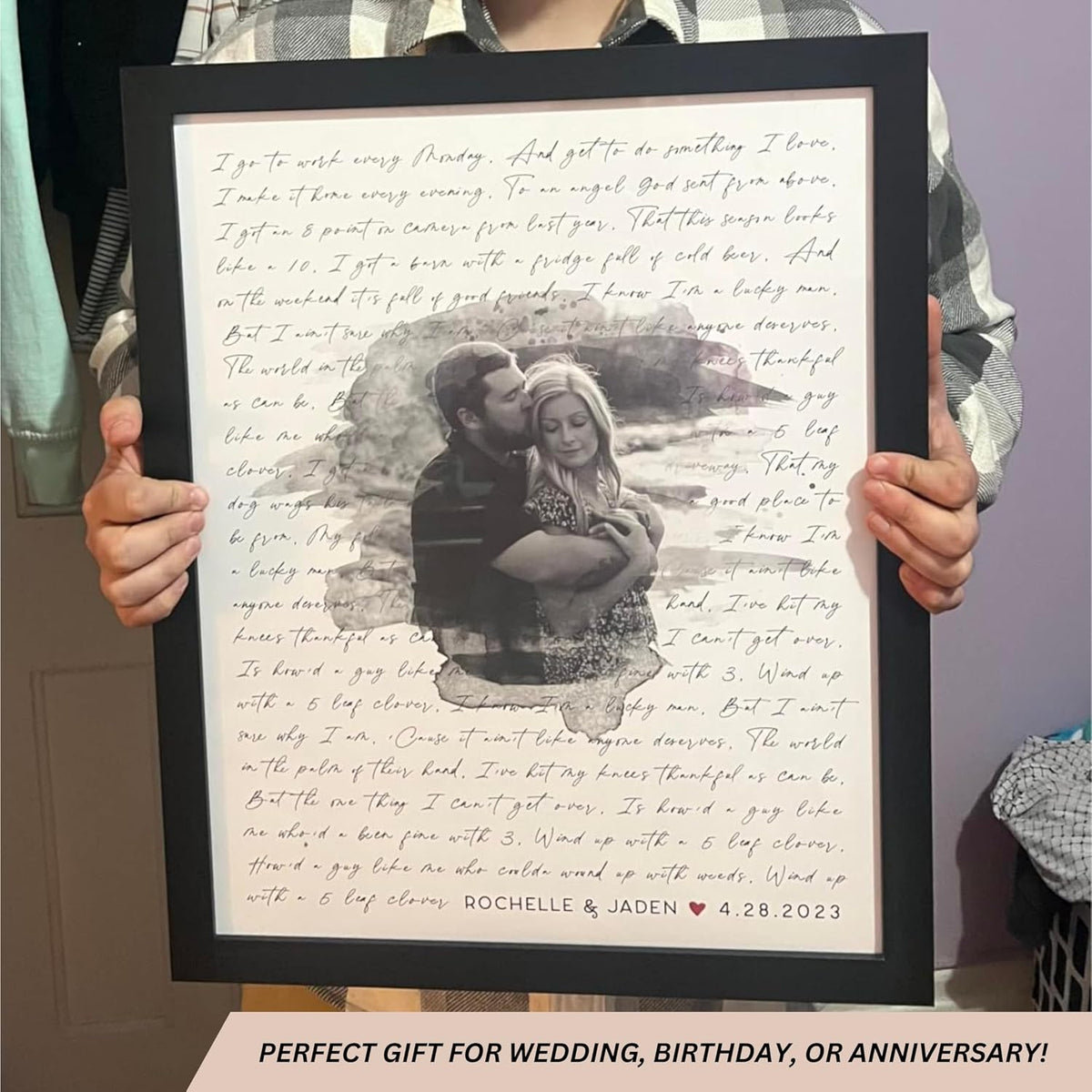 Framed wedding photo and lyrics art on wall