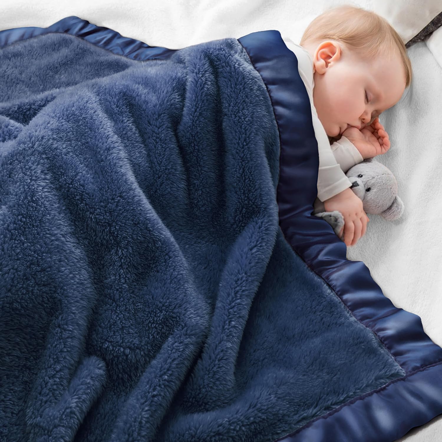 Pro Goleem fleece baby blanket with satin trim front view showing navy blue plush fabric.