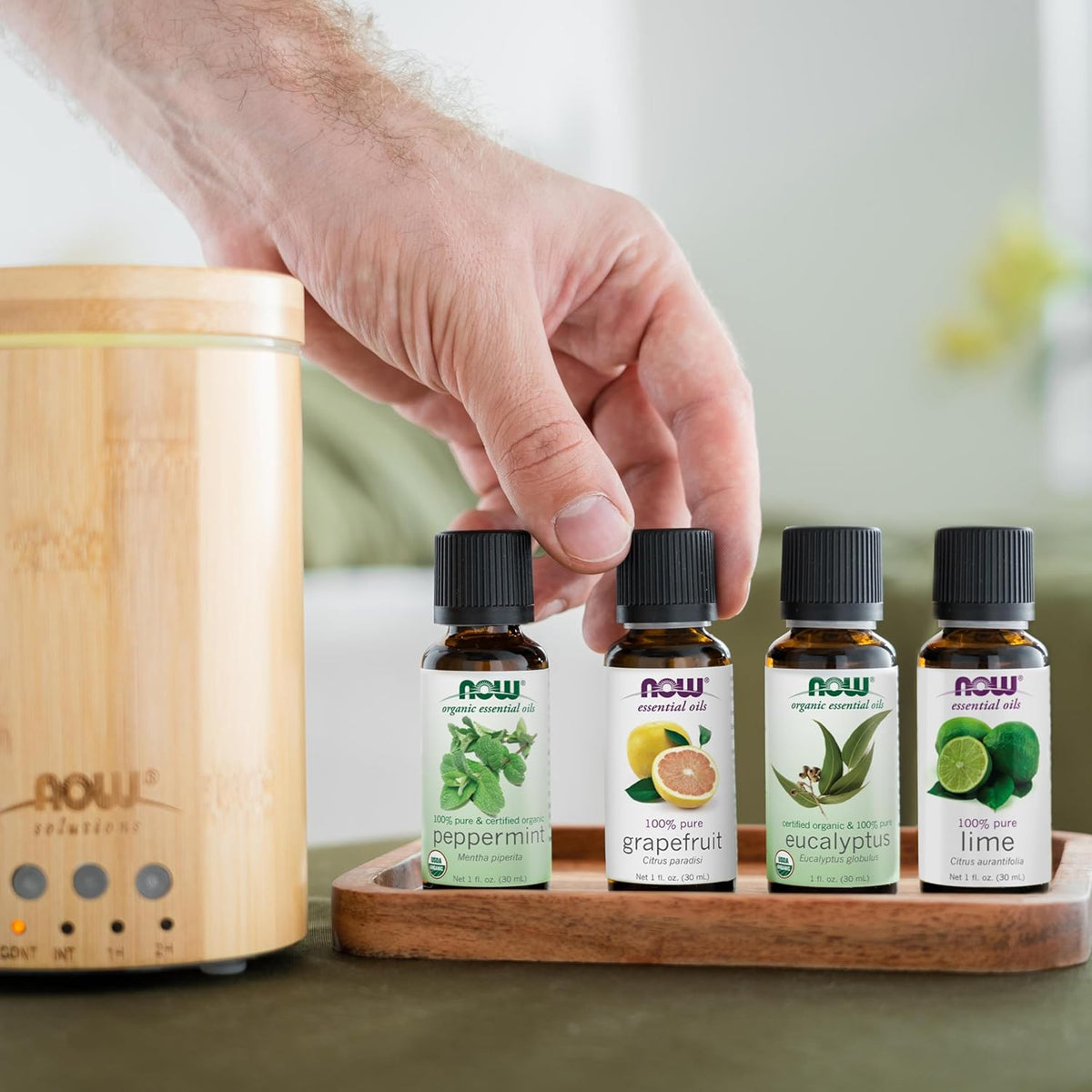 Now Foods real bamboo diffuser placed on living room wooden table