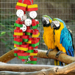 Close up of the colorful non toxic wooden blocks on the MEWTOGO parrot chewing toy.