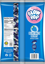 Individually wrapped Charms Blue Razz Berry Blow Pops scattered on a surface