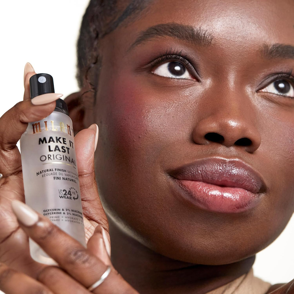 Milani illuminating face primer and natural finish setting mist bottles for radiant skin